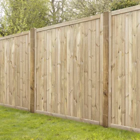 Some tongue and groove fence panels put up with posts in a garden