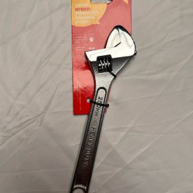 32mm adjustable spanner, metallic, with a red and orange label