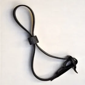 tree tie with a buckle fastener, all black material on a white background.