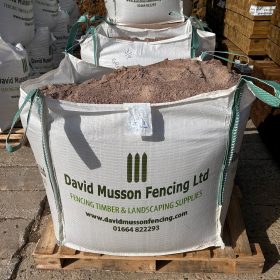 A granite dust bulk bag on a pallet