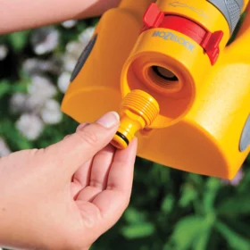 The Hozelock Accessory Adaptor being used to adapt a female end into a male end