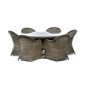 A 150cm diameter round rattan garden dining set featuring a glass-topped table and six curved armchairs with a woven finish against a white background