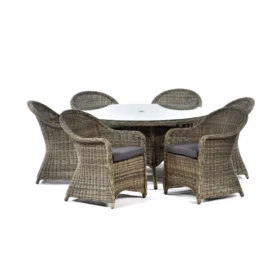 The Regent rattan large round glass table and chair set showing off the seat section of the chairs against a white backgroun