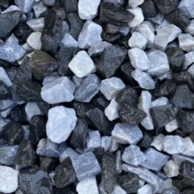 Decorative polar black ice chippings with a striking blend of black and white angular stones – perfect for driveways and garden features. Available in black ice chippings bulk bag and smaller quantities of premium black ice chippings.