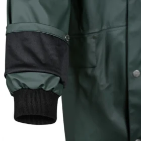 Close-up of sleeve on green waterproof jacket showing adjustable cuff, ribbed inner storm cuff, and snap closure – designed for secure weather protection.