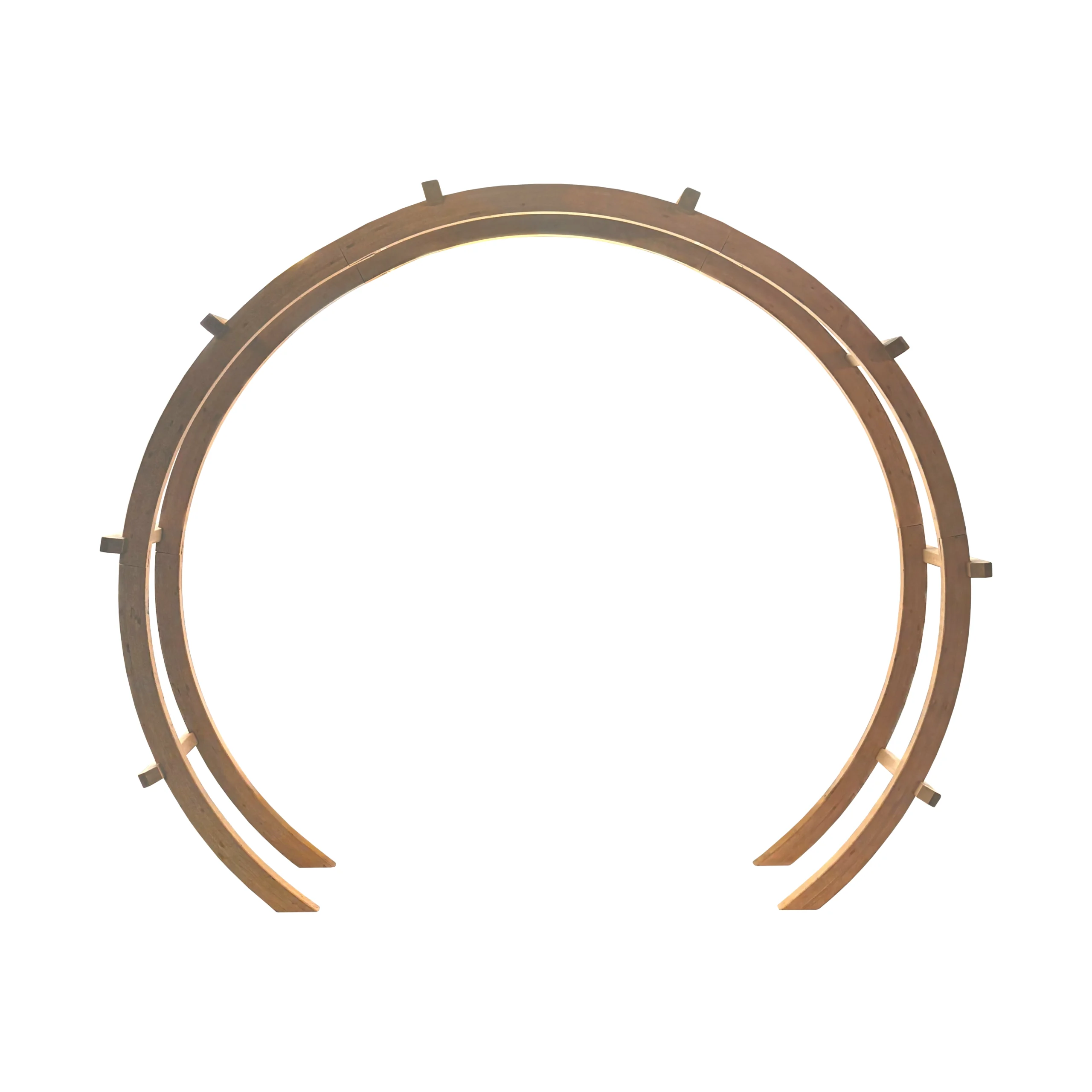 Front view of a large wooden round pergola, forming a symmetrical flower circle with a graceful round arch ideal for outdoor events and climbing plants.