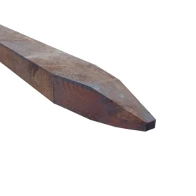 pointed creosote post, dark brown with a 4 way point on one end.